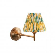 brass wall light with yellow and jade ikat shade