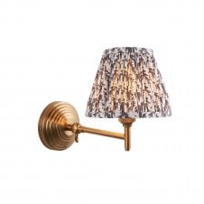 brass wall light with grey leaf pattern shade
