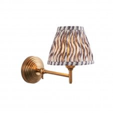 brass wall light with grey ripple pattern shade