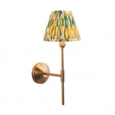 brass t bar wall light with yellow and jade ikat pattern shade
