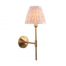 brass t bar wall light with leaf pattern shade in beach