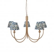 brass curved ceiling pendant with ikat blue shades