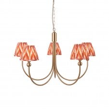 brass curved 5 light ceiling pendant with zigzag patter shades in apricot