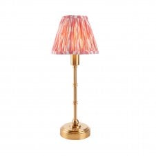 brass rechargeable table lamp with pink ikat pattern shade