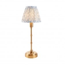 brass rechargeable table lamp with blue leaf pattern shade