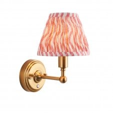 brass rechargeable wall light with coral pink ripple pattern shade