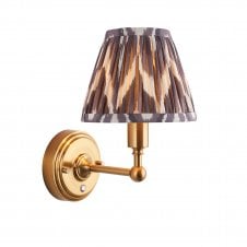 brass rechargeable wall light with grey zigzag pattern shade
