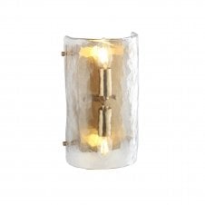 modern wall light in brushed brass finish with clear textured glass curved shade 