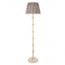 white floor lamp with grey leaf pattern shade