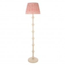 white floor lamp with pink ripple pattern shade