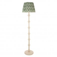 white floor lamp with green zigzag shade