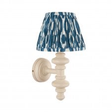 white wall light with blue ikat pattern shade