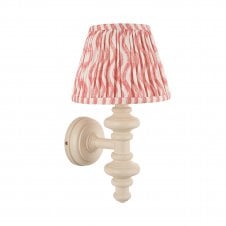 white wall light with pink ripple pattern shade