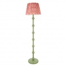 green floor lamp with pink ikat pattern shade