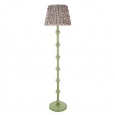 green floor lamp with grey leaf pattern shade