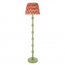 green floor lamp with orange zigzag pattern shade