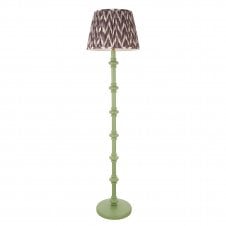 green floor lamp with grey zigzag pattern shade