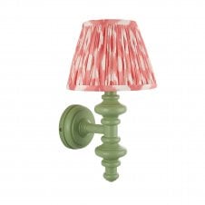 green wall light with pink ikat pattern shade