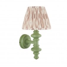 green wall light with neutral ikat pattern shade