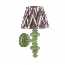 green wall light with grey zigzag pattern shade