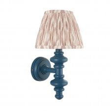 blue wall light with neutral ikat pattern shade