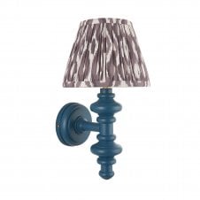 blue wall light with grey ikat pattern shade