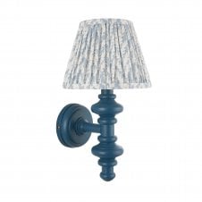 dark blue wall light with pale blue leaf pattern shade