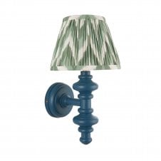 blue wall light with green zigzag printed shade