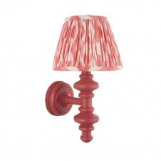 pink wall light with ikat pattern shade