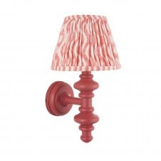 pink wall light with coral ripple pattern shade