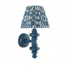 blue wall light with ripple pattern shade