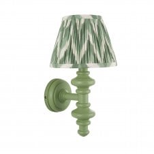 green wall light with zigzag pattern shade