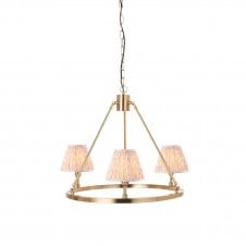brass circular ceiling light with peach pattern shades