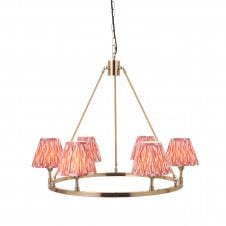 brass circular ceiling pendant with coral pink pattern shades