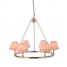 brass circular ceiling light with ripple print coral pink shades