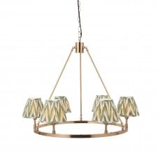 brass circular ceiling light with zigzag shades in green