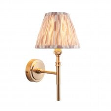 brass wall light with neutral ikat pattern shade