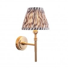 brass wall light with grey pattern shade