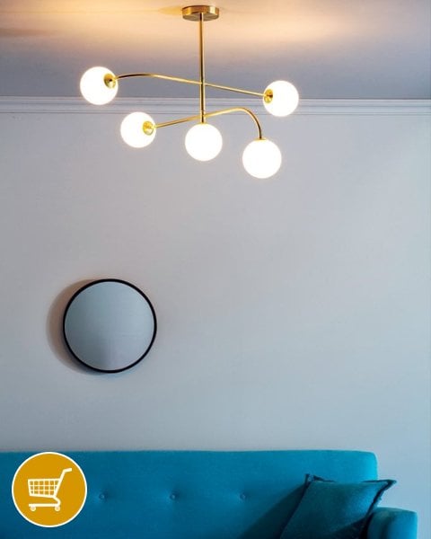 gold ceiling light with white globes