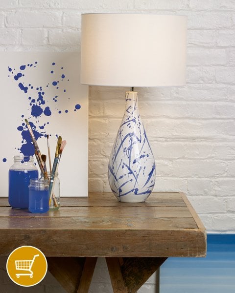 white and blue ceramic table lamp with shade
