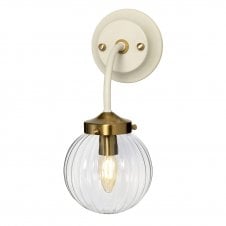 Glass globe wall light bracket, cream and aged brass