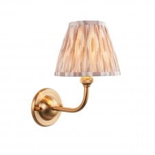 brass wall light with neutral ikat pattern shade