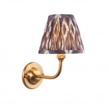 brass wall light with grey ikat pattern shade