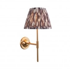 brass wall light with grey ikat pattern shade