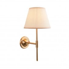 brass wall light with white tapered shade