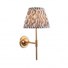 brass wall light with grey ripple pattern shade