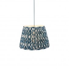 brass and blue suspension with blue ikat pattern shade