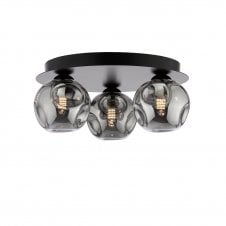 a modern three light flush ceiling fitting with smoked organic glass shades