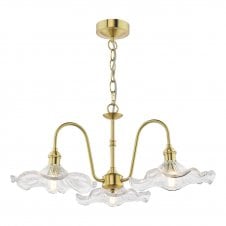 a traditional brass three arm ceiling pendant with wavy edged glass shades