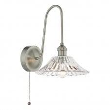 traditional wall light in an antique chrome finish with flared glass shade